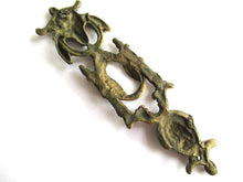 Antique escutcheon with Buck-Ram, keyhole frame, solid brass.