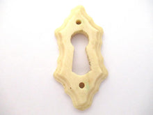 UpperDutch:Keyhole cover,Bone Keyhole cover, plate, bone escutcheon, keyhole frame.