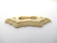 UpperDutch:Keyhole cover,Bone Keyhole cover, plate, bone escutcheon, keyhole frame.