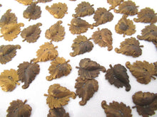 UpperDutch:Furniture applique,Set of 10 Antique Ornate Brass Leaves.