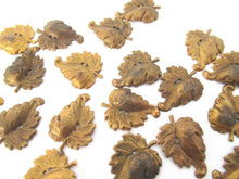 UpperDutch:Furniture applique,Set of 10 Antique Ornate Brass Leaves.