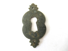 Vintage metal Escutcheon.