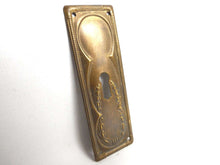 UpperDutch:Hooks and Hardware,Keyhole cover, Brass Stamped Shabby Escutcheon, keyhole plate.