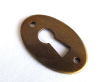 UpperDutch:Hooks and Hardware,1 (ONE) small Oval Keyhole cover, Vintage brass escutcheon, key hole frame, plate.