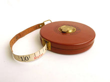 UpperDutch:Home and Decor,Tape measure, Stabila 25 meter leather wind up measuring tape. 'Beste lederkapsel' German tool, beautiful red and black numbers.