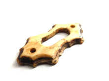 UpperDutch:Hooks and Hardware,Bone Keyhole cover, plate, bone escutcheon, keyhole frame.